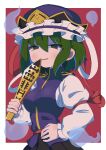  1girl 6gd7b blue_headwear border breasts frilled_hat frills ghost green_eyes green_hair half-closed_eyes hat highres holding juliet_sleeves long_sleeves looking_at_viewer open_mouth puffy_sleeves red_background rod_of_remorse shiki_eiki short_hair simple_background smile solo touhou upper_body white_border 