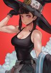 1girl biceps black_gloves black_hair black_shirt black_tank_top breasts cleavage en&#039;en_no_shouboutai gloves hat highres large_breasts lips looking_at_viewer magion02 maki_oze purple_eyes red_background shirt sidelocks simple_background smile smoke solo sweat tank_top toned witch_hat 