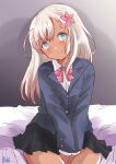  1girl alternate_costume bed black_skirt blazer blonde_hair blue_eyes blue_jacket bow bowtie collared_shirt commentary_request flower fuji_(pixiv24804665) hair_flower hair_ornament highres jacket kantai_collection long_hair looking_at_viewer pink_bow pink_bowtie pleated_skirt ro-500_(kancolle) school_uniform shirt sitting skirt smile solo tan v_arms wariza 