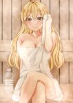  1girl blonde_hair bottle breasts brown_eyes crossed_legs hair_between_eyes hair_down highres holding holding_towel kantai_collection koru_pera large_breasts long_hair naked_towel sauna sitting smile solo steam towel water_bottle zara_(kancolle) 