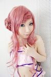  blue_eyes code_geass cosplay double_bun euphemia_li_britannia hair_buns long_hair midriff navel photo pink_hair solo standing swimsuit tatsuki 