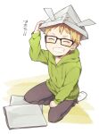  1boy aged_down black_pants blonde_hair closed_eyes full_body glasses green_hoodie haikyuu!! hood hoodie male_focus pants paper paper_hat paper_kabuto short_hair sitting socks solo tsukishima_kei wai wariza white_socks 