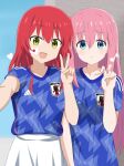 2022_fifa_world_cup 2girls :d alternate_costume blue_eyes blue_shirt bocchi_the_rock! closed_mouth dars_(recolors) gotou_hitori green_eyes heart highres japanese_flag kita_ikuyo multiple_girls musical_note open_mouth pink_hair red_hair selfie shirt short_sleeves smile soccer_uniform sportswear v world_cup 