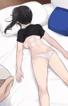  1girl ass black_hair black_shirt cait_aron clothes_lift from_behind highres kneepits lying on_stomach original panties pillow ponytail shirt shirt_lift solo_focus underwear white_panties 