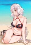  1girl absurdres ahoge arm_support bangs bikini breasts cleavage crossed_bangs day fate/grand_order fate_(series) grey_hair hair_between_eyes high_heels highres jeanne_d&#039;arc_alter_(fate) jeanne_d&#039;arc_alter_(swimsuit_berserker)_(fate) large_breasts light_blush long_hair looking_at_viewer ocean outdoors parted_lips sand sandals smile solo strappy_heels swimsuit thigh_gap thighs toes tomotomow00w very_long_hair water white_hair yellow_eyes 