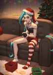  1girl bangs bare_shoulders box bullet_necklace christmas_tree closed_mouth coal collarbone couch crop_top english_text frown gift gift_box green_hair hat highres indoors jewelry jinx_(league_of_legends) league_of_legends long_hair necklace no_shoes pink_eyes red_headwear red_shorts red_thighhighs santa_hat shorts single_thighhigh sitting socks solo stomach thighhighs vatheja very_long_hair white_thighhighs 