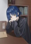  1girl absurdres black_shirt blue_hair bocchi_the_rock! bookshelf closed_mouth elbow_rest from_side glass highres kit long_sleeves looking_at_viewer mole mole_under_eye notebook pov_across_table shirt short_hair solo upper_body yamada_ryou yellow_eyes 