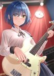  1girl akiyama0818 bangs bass_guitar blue_hair bocchi_the_rock! breasts hair_ornament hairpin highres holding holding_instrument instrument jewelry long_sleeves looking_at_viewer mole mole_under_eye neck_ribbon ribbon shirt short_hair solo white_shirt yamada_ryou yellow_eyes 