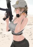  1girl bangs bare_arms bare_shoulders baseball_cap black_pants blurry blurry_background breasts cleavage commentary day english_commentary finger_on_trigger from_side green_eyes grey_headwear grey_sports_bra gun h&amp;k_mp5 hair_between_eyes hand_on_headphones hands_up hat headphones headphones_around_neck highres holding holding_gun holding_weapon large_breasts lips looking_to_the_side midriff mole mole_under_mouth navel original outdoors pants parted_lips profile sand short_hair sidelocks solo sports_bra stomach submachine_gun sweat text_print tsurui weapon 