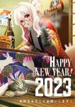  1girl 2023 absurdres alcohol arm_support bangs blanket bottle calendar_(object) cat choko_(cup) commentary cup drink food fruit glasses gradient_hair hair_bun happy_new_year highres holding holding_cup indoors japanese_clothes kimono kotatsu long_sleeves looking_at_viewer mandarin_orange mimizuku_suana multicolored_hair nengajou new_year open_mouth original print_kimono red_eyes red_kimono sake sake_bottle sitting solo steam table tatami tokkuri translated under_kotatsu under_table white_hair 