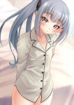  1girl absurdres arms_behind_back black_ribbon blush brown_eyes buttons closed_mouth commentary_request cowboy_shot grey_hair hair_ribbon highres kantai_collection kasumi_(kancolle) long_hair long_sleeves makura_(y_makura) pajamas ribbon side_ponytail solo white_pajamas 