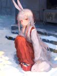  1girl absurdres animal animal_ears blush grey_hair hair_ornament hand_on_own_cheek hand_on_own_face head_rest highres ichika_(ichika87) japanese_clothes long_hair looking_at_viewer miko new_year okobo original outdoors petting rabbit rabbit_ears rabbit_girl red_eyes red_footwear red_skirt sandals skirt smile snow solo squatting stairs sunlight white_skirt x_hair_ornament 