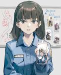  1girl bangs black_eyes blue_shirt blunt_bangs blush breast_pocket cellphone chinese_commentary collarbone collared_shirt commentary_request hand_up highres holding holding_phone long_sleeves looking_at_viewer medium_hair original parted_lips phone pocket police police_uniform policewoman shirt smartphone solo straight-on teeth tennohi uniform upper_body upper_teeth_only 
