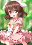  1girl animal animal_ears barefoot black_hair blush carrot_necklace dress frilled_sleeves frills hair_between_eyes highres inaba_tewi jewelry necklace open_mouth pink_dress rabbit rabbit_ears rabbit_tail red_eyes ruu_(tksymkw) short_hair short_sleeves smile solo tail touhou 