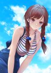  1girl asanogawa_(tutufcc) bangs bare_shoulders bikini bikini_top_only braid breasts brown_hair cleavage collarbone highres large_breasts leaning_forward long_hair looking_at_viewer original overalls purple_eyes sky smile solo strap_slip striped striped_bikini swept_bangs swimsuit twin_braids 