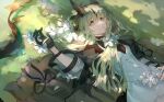  1girl arknights arm_up awakeningdog blonde_hair brown_coat coat commentary dappled_sunlight dragon_girl dragon_horns dragon_tail dress flame-tipped_tail flower grass green_eyes hair_flower hair_ornament hand_on_own_stomach highres horns light_smile lying on_back outdoors reed_(arknights) reed_the_flame_shadow_(arknights) solo sunlight tail upper_body white_dress white_flower 