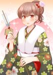  1girl arrow_(projectile) blush brown_eyes brown_hair ema floral_print fur-trimmed_kimono fur_trim green_kimono hamaya holding japanese_clothes jewelry kantai_collection kimono long_hair long_sleeves looking_at_viewer obi official_alternate_costume ooi_(kancolle) open_mouth print_kimono ring rui_shi_(rayze_ray) sash smile solo upper_body wedding_ring wide_sleeves 