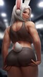  1girl animal_ears ass bare_arms black_shorts black_sports_bra blurry blurry_background bokeh boku_no_hero_academia dark-skinned_female dark_skin depth_of_field from_behind hands_on_own_ass long_hair looking_at_viewer median_furrow mirko numanoan parted_lips rabbit_ears rabbit_girl rabbit_tail red_eyes shorts smile solo sports_bra tail tail_through_clothes thighs toned white_hair 