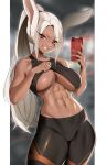  1girl abs animal_ears bare_arms bare_shoulders black_pants black_sports_bra blurry blurry_background blush boku_no_hero_academia breasts cellphone commentary dark-skinned_female dark_skin english_commentary grin highres large_breasts long_hair looking_at_viewer mirko navel pants parted_lips patreon_username phone ponytail rabbit_ears red_eyes smartphone smile solo sports_bra sweat teeth tofuubear white_hair 