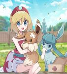  1girl :d bandaged_ear bangs blonde_hair blue_eyes blush box cloud commentary_request day eevee eyelashes falling_leaves glaceon hair_between_eyes haru_(haruxxe) holding holding_pokemon irida_(pokemon) leaf open_mouth outdoors pokemon pokemon_(creature) pokemon_(game) pokemon_legends:_arceus red_shirt sash shirt short_hair shorts sitting sky smile strapless strapless_shirt tearing_up waist_cape 