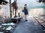  1girl bag bench black_coat bridge brown_eyes brown_footwear brown_hair coat day duffel_bag hands_in_pockets highres looking_at_viewer original outdoors railroad_tracks sakeharasu scarf scenery short_hair sign sky snow snowing solo standing stone_bench train_station tree 