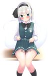  1girl bangs black_bow black_bowtie black_hairband black_socks blush body_writing bow bowtie commentary_request ghost green_eyes green_skirt green_vest grey_hair hairband highres konpaku_youmu konpaku_youmu_(ghost) long_sleeves looking_at_viewer open_mouth shishiky short_hair sitting skirt socks solo touhou translation_request vest 