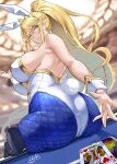  1girl absurdres animal_ears artoria_pendragon_(fate) artoria_pendragon_(swimsuit_ruler)_(fate) ass backless_leotard bare_shoulders blonde_hair blue_pantyhose blurry blurry_background breasts card dated fake_animal_ears fake_tail fate/grand_order fate_(series) from_behind gold_trim green_eyes high_ponytail highres king_of_hearts_(card) large_breasts leotard long_hair looking_at_viewer looking_back looking_down official_alternate_costume pantyhose parted_lips playboy_bunny playing_card rabbit_ears rabbit_tail shiiki_(love-saber) sideboob signature sitting solo tail tiara white_leotard wrist_cuffs 