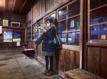  1girl bag bench black_coat brown_footwear brown_hair building coat duffel_bag full_body grey_skirt highres indoors leggings original pleated_skirt poster_(object) sakeharasu scarf skirt solo standing train_station window 