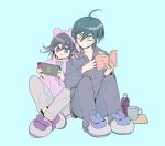  2boys :q ahoge bangs black_hair black_jacket black_pants blush book bottle brown_eyes collarbone commentary_request cup danganronpa_(series) danganronpa_v3:_killing_harmony fanta grey_background grey_pants hair_between_eyes handheld_game_console highres holding holding_book holding_handheld_game_console hood hood_up hoodie jacket knees_up long_sleeves male_focus multiple_boys nintendo_switch open_book ouma_kokichi pants pink_hoodie purple_eyes saihara_shuuichi shoes short_hair simple_background suzuko_(katahaba_v3) tongue tongue_out 