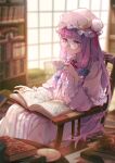  1girl bespectacled blue_bow book bookshelf bow chair closed_mouth crescent crescent_hat_ornament cup dress frilled_sleeves frills glasses hair_bow hat hat_ornament highres holding holding_cup kyusoukyu long_hair long_sleeves mob_cap open_book patchouli_knowledge purple_eyes purple_hair red_bow round_eyewear sidelocks sitting solo striped striped_dress touhou vertical-striped_dress vertical_stripes white_headwear wide_sleeves 