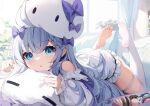  1girl ahoge bangs benghuai_xueyuan blue_bow blue_eyes blue_hair blush bow braid character_request food frilled_sleeves frills hair_bow highres honkai_(series) looking_at_viewer lying macaron nahaki on_stomach parted_lips single_thighhigh soles solo thigh_strap thighhighs white_thighhighs 