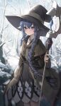  absurdres bangs bare_tree black_headwear blue_eyes blue_hair blurry braid brown_cape cape cowboy_shot crossed_bangs dress hair_between_eyes hat highres holding holding_staff light_blush long_braid lunia mushoku_tensei roxy_migurdia snow staff tree twin_braids winter witch_hat 