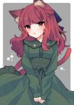  1girl adapted_costume alternate_hairstyle animal_ear_fluff animal_ears blush border cat_ears cat_tail dress green_dress highres kaenbyou_rin long_hair long_sleeves multiple_tails necono_(nyu6poko) parted_lips red_eyes red_hair sidelocks skull_print solo tail touhou two_tails upper_body white_border 