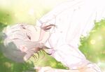  1boy collar_x_malice collared_shirt flower grass grey_hair hair_flower hair_ornament kaori looking_at_viewer lying male_focus multicolored_hair okazaki_kei on_back on_grass pink_flower purple_eyes shirt short_sleeves solo white_hair white_shirt 