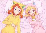  2girls aikatsu!_(series) aikatsu_stars! blush cat cat_day cat_pajamas commentary fake_tail gradient_hair green_eyes hood kumahubuki multicolored_hair multiple_girls nijino_yume on_bed orange_eyes orange_hair pajamas pink_pajamas saotome_ako smile symbol-only_commentary tail yellow_pajamas 