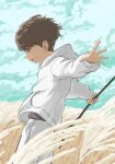  1boy absurdres blue_sky blurry blurry_background blurry_foreground brown_hair child cloud cloudy_sky highres hikae25671345 holding hood hoodie long_sleeves male_child male_focus open_mouth original outdoors outstretched_arms scenery sky solo wheat_field white_hoodie wind 