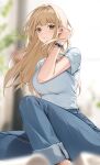  1girl blonde_hair blue_pants blurry blurry_background blurry_foreground breasts brown_eyes denim depth_of_field hand_up highres large_breasts long_hair looking_at_viewer open_mouth original pants shirt short_sleeves sitting sitting_sideways solo sweatdrop tachibana_(hcimup) watch white_shirt wristwatch 