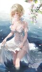  1girl absurdres bare_shoulders blonde_hair blush breasts cleavage collarbone dress flower genshin_impact hair_between_eyes hair_flower hair_ornament highres large_breasts leaf looking_at_viewer lumine_(genshin_impact) petals pottsness short_hair_with_long_locks skirt_hold solo thighs twitter_username wading water wet white_dress white_flower yellow_eyes 