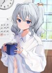  1girl absurdres blue_eyes breasts buttons calendar_(object) clock coffee coffee_mug cup frown grey_hair hat highres indoors kantai_collection kashima_(kancolle) long_hair mug oversized_clothes oversized_shirt partially_unbuttoned shirt sidelocks tsurime twintails wavy_hair white_shirt window yoshino_(mfmfpng) 