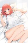  1girl bare_legs barefoot blue_eyes blunt_bangs blush breasts casual commentary convenient_leg curvy eyelashes feet_out_of_frame go-toubun_no_hanayome hair_down hands_up head_on_pillow highres indoors kakato_0 large_breasts lens_flare looking_at_viewer lying medium_hair nakano_nino on_back on_bed open_hands open_mouth oversized_clothes red_hair shirt short_sleeves shy sidelighting solo thighs tsurime white_shirt 