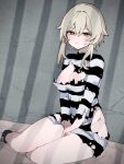  1girl blonde_hair blush breasts cleavage closed_mouth commentary cuffs genshin_impact indoors kuromu_shado large_breasts long_sleeves lumine_(genshin_impact) no_pupils on_floor prison_cell prison_clothes restrained shackles shirt short_hair_with_long_locks sidelocks sitting solo striped striped_shirt torn_clothes torn_shirt yellow_eyes yokozuwari 