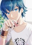  1boy black_nails blue_eyes blue_hair closed_mouth earrings hair_between_eyes highres hm89509321 jewelry luka_couffaine miraculous_ladybug shirt short_hair smile solo t-shirt white_shirt wristband 