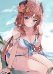  1girl beach bikini blue_eyes breasts cleavage closed_mouth fake_horns genshin_impact highres horns long_hair looking_at_viewer low_twintails maruro medium_breasts navel nilou_(genshin_impact) outdoors red_hair sitting solo swimsuit twintails very_long_hair water wet 