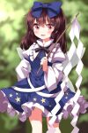  1girl :d black_ribbon blue_bow blue_dress blurry blurry_background blush bow brown_hair commentary_request dress frilled_shirt_collar frills gohei hair_between_eyes hair_bow highres holding holding_stick long_hair open_mouth outdoors petticoat pink_eyes ribbon ruu_(tksymkw) smile solo star_sapphire stick touhou 