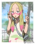  1girl blonde_hair blurry blurry_background border double_v facepaint grey_eyes highres jewelry long_hair looking_at_viewer mina_(pokemon) open_mouth paint_in_hair paint_on_clothes pokemon pokemon_(game) pokemon_sm ring shirt solo tellzeta twitter_username upper_body v white_border 