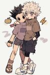  2boys bandaid bandaid_on_leg black_eyes bracelet candy closed_mouth commentary couple food full_body gon_freecss hand_in_pocket hand_on_another&#039;s_shoulder highres holding holding_candy holding_food hunter_x_hunter jewelry killua_zoldyck layered_sleeves looking_at_viewer male_child male_focus multiple_boys na8_06 short_hair short_sleeves shorts simple_background smile spiked_hair symbol-only_commentary tongue tongue_out white_hair yaoi 