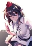  1girl ashiroku_(miracle_hinacle) black_hair black_skirt closed_mouth collared_shirt hair_between_eyes hat one_eye_closed pointy_ears red_eyes red_headwear shameimaru_aya shirt short_hair skirt smile solo tokin_hat touhou white_shirt 