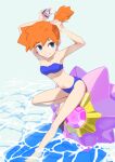  1girl absurdres adjusting_hair arataarata bare_legs bare_shoulders barefoot bikini blue_bikini blue_eyes breasts commentary_request earrings grin highres jewelry knee_up leaning_forward long_bangs looking_at_viewer misty_(pokemon) navel orange_hair pokemon pokemon_(creature) short_hair side_ponytail sitting smile starmie strapless strapless_bikini swimsuit 