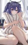  1girl blue_archive blurry blurry_background blush chinese_commentary clisapex closed_mouth commentary grey_panties hair_between_eyes halo highres hugging_object indoors long_hair looking_at_viewer mechanical_halo panties pillow pillow_hug purple_eyes purple_hair solo two_side_up underwear yuuka_(blue_archive) 