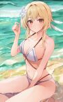  1girl bare_arms bare_shoulders between_legs bikini blonde_hair blush breasts brown_eyes cleavage collarbone commentary_request genshin_impact hand_between_legs hand_up highres looking_at_viewer lumine_(genshin_impact) medium_breasts navel parted_lips racchi. shallow_water sitting solo sweat swimsuit water waves white_bikini yokozuwari 